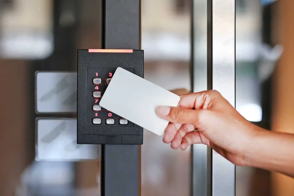 Person using Card Access Control to enter building.