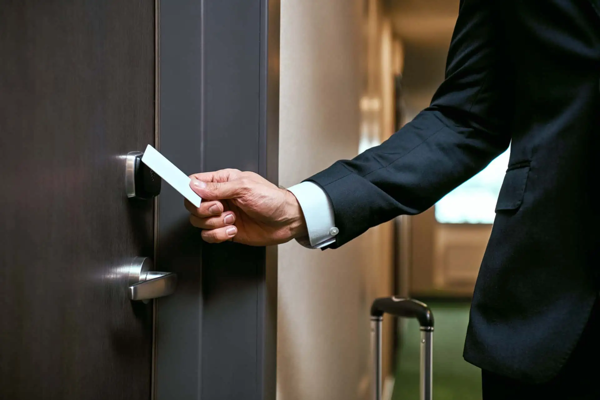 Man accessing office with Onity Lock Management Systems integration