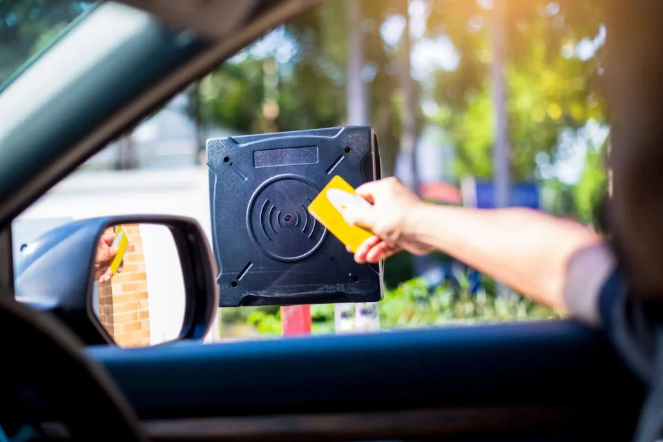 User using Wireless RFID & Vehicle Reader to access parking on Oahu